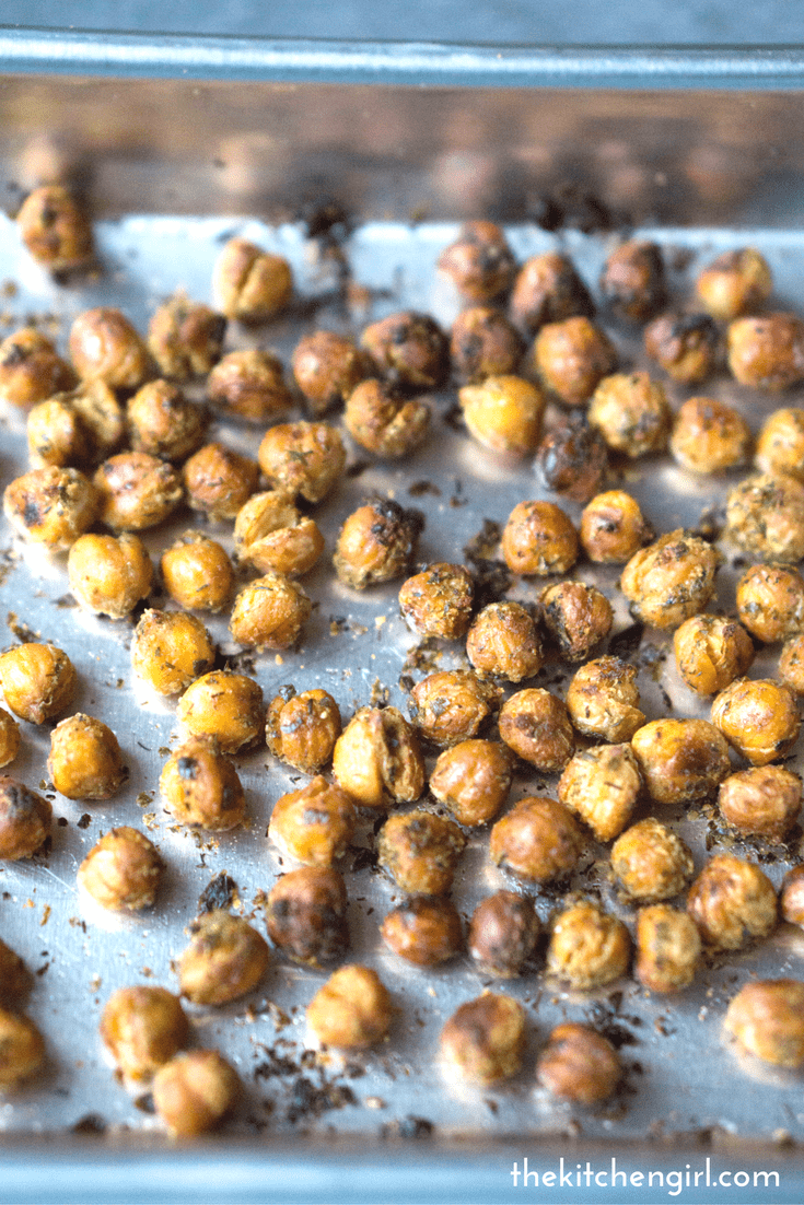 herb roasted chickpeas on baking sheet