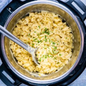 mac and cheese in Instant Pot with serving utensil
