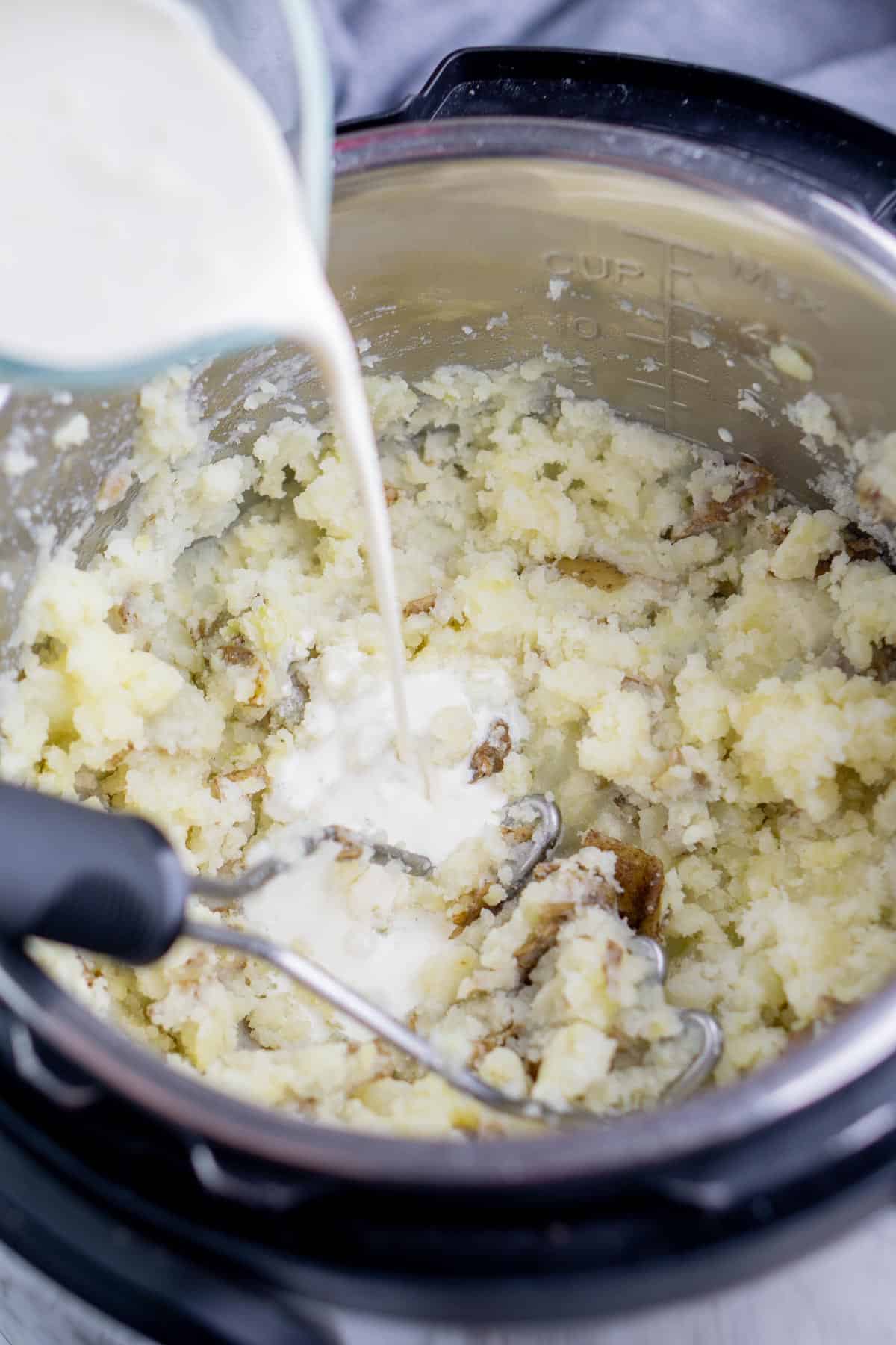 Heavy cream is added to mashed potatoes in Instant Pot