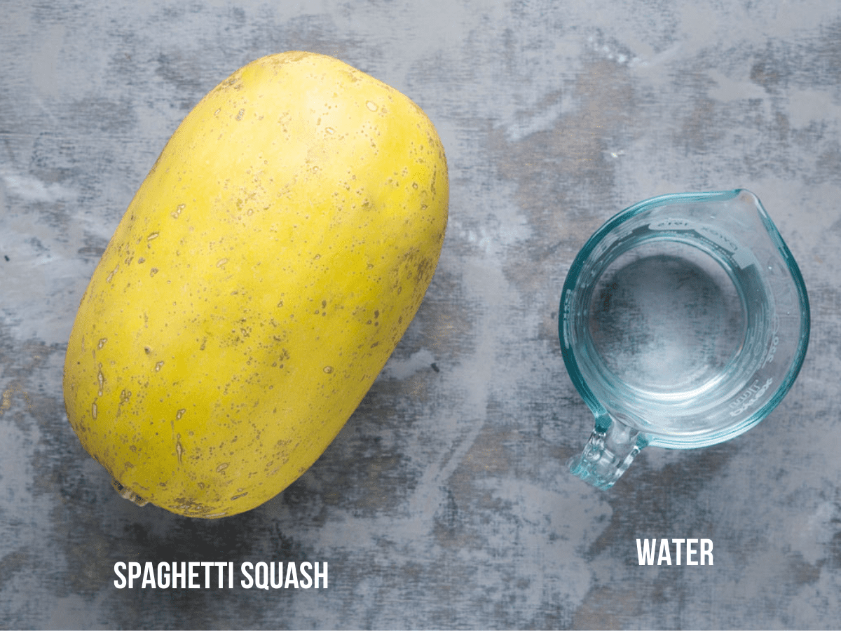whole spaghetti squash and water are ready to be cooked