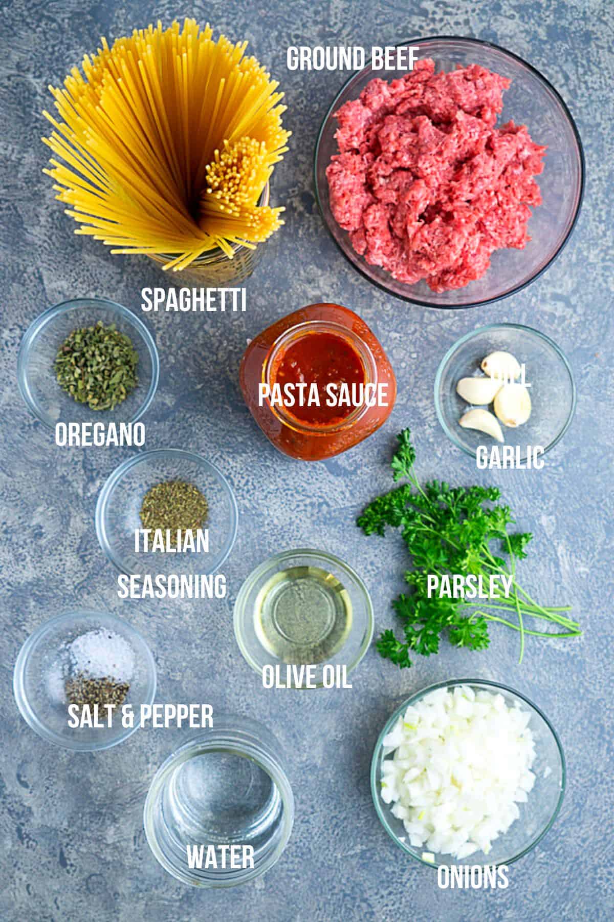 instant pot spaghetti ingredients in glass bowls with text overlay