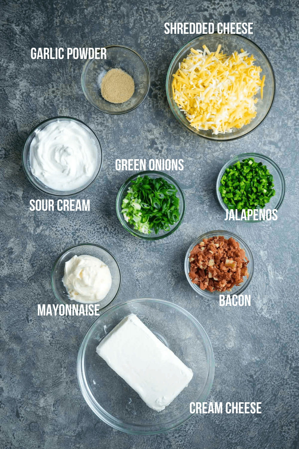jalapeno popper dip ingredients in glass bowls with text overlay