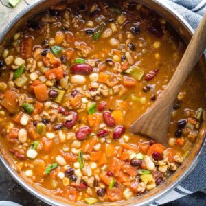 turkey chili in pot with wooden spoon