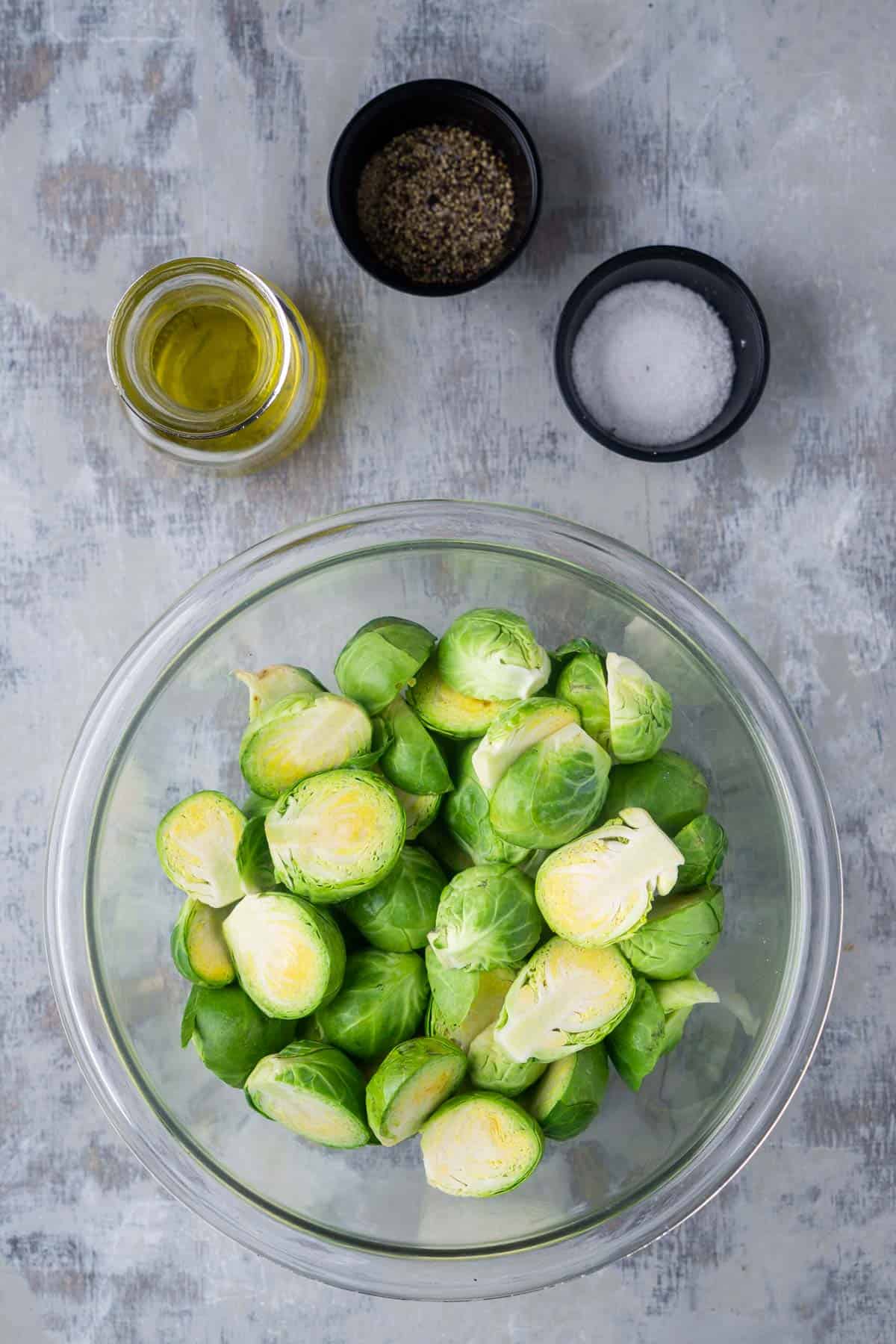 Overhead view of air fryer Brussels sprouts ingredients