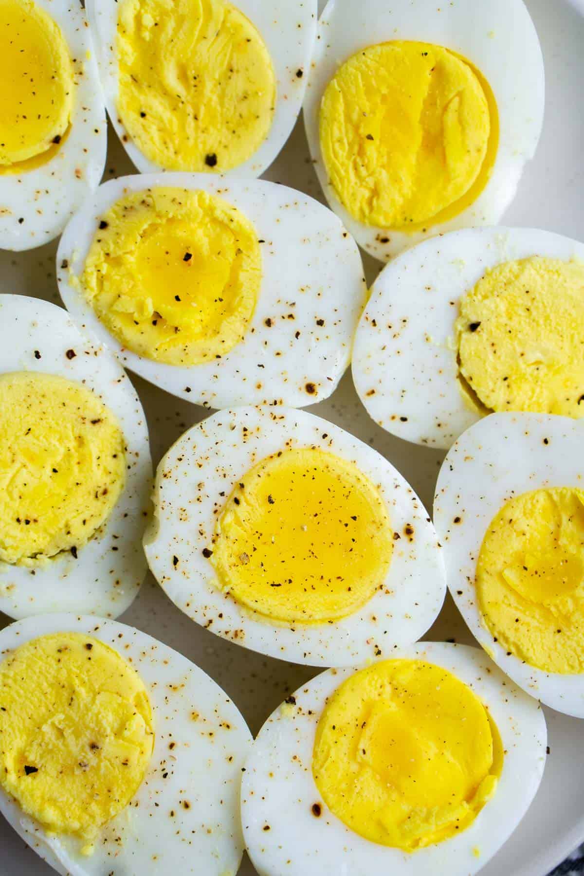 Halved air fryer hard boiled eggs with seasoning
