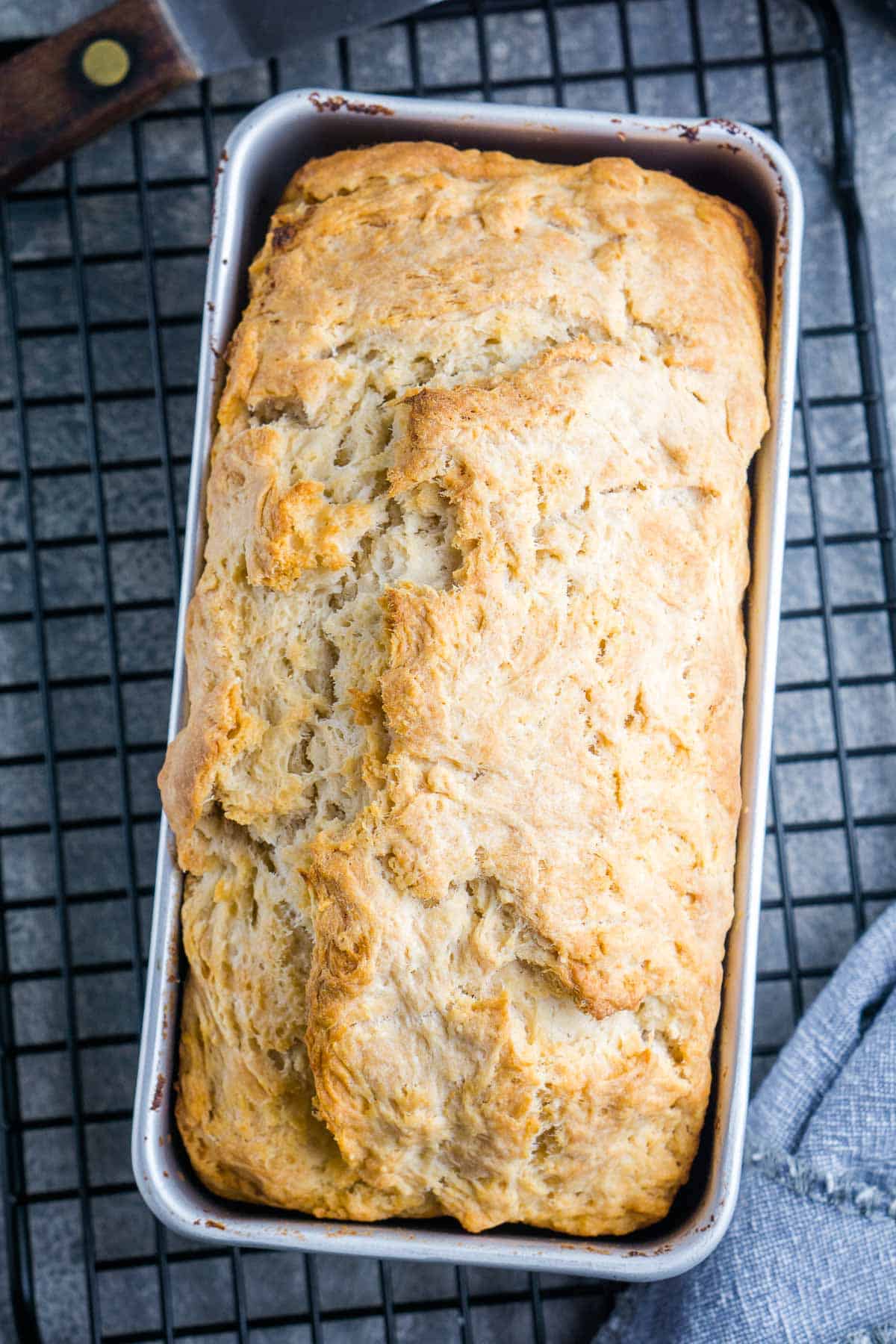 baked crusty beer bread in loaf pan