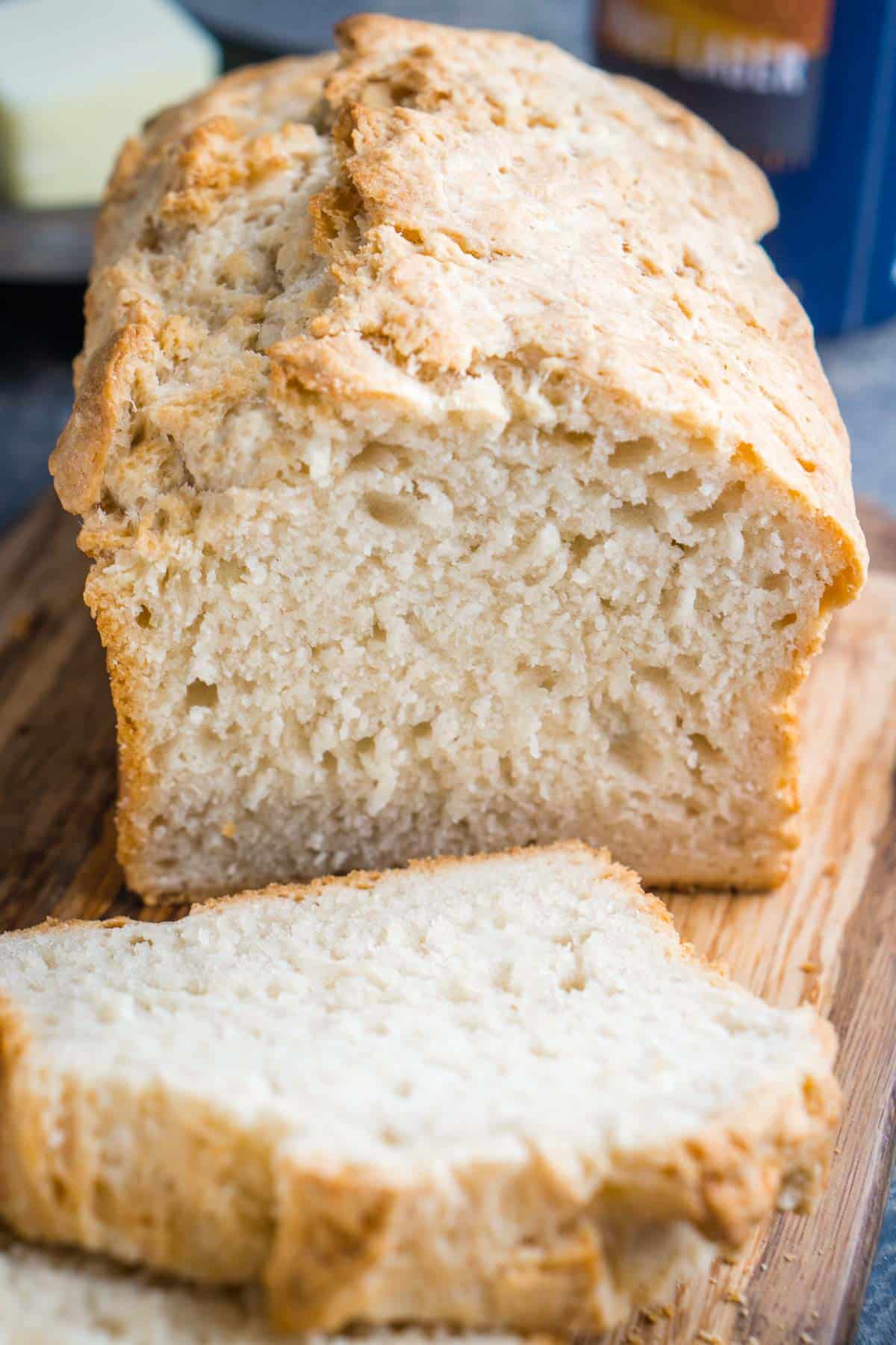 sliced beer bread on wood cutting board