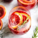 blood orange mimosa in wine glass