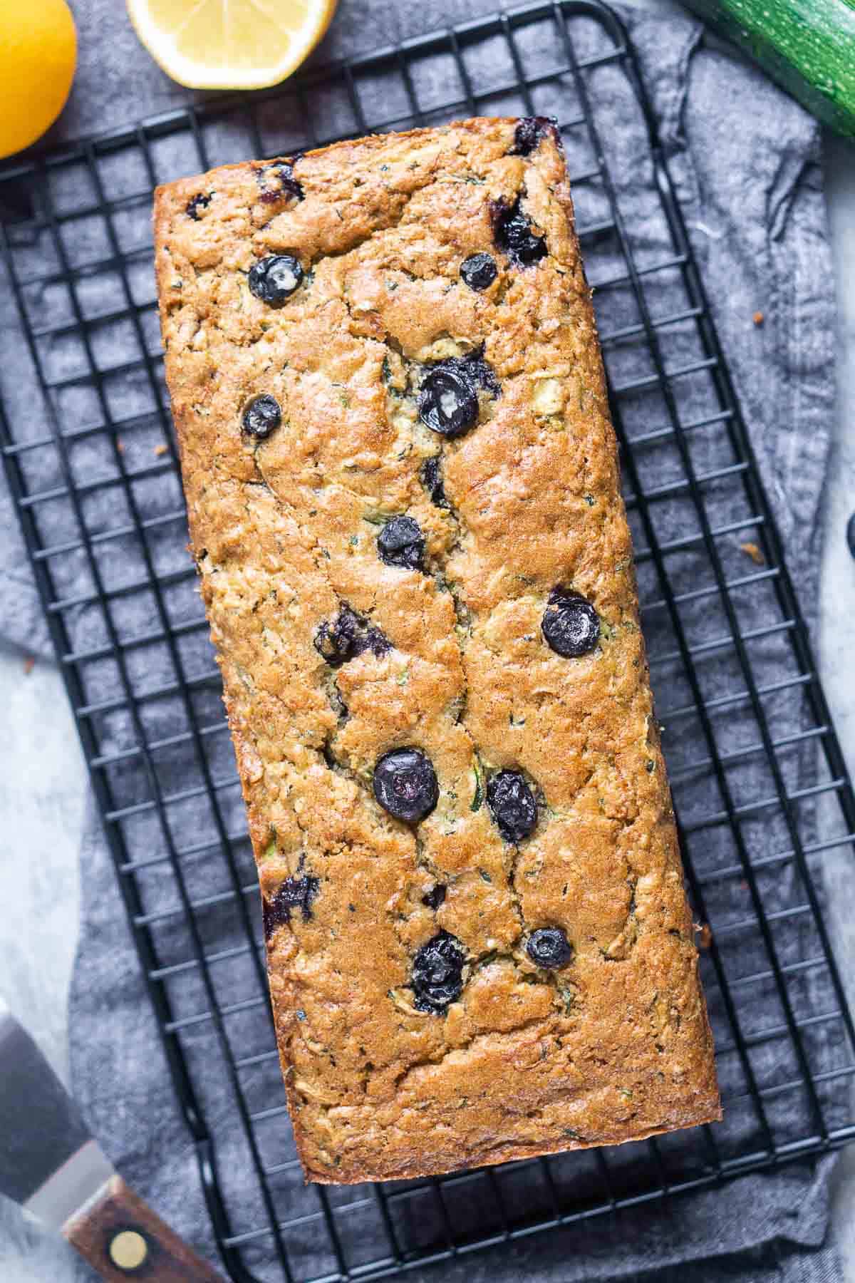 freshly baked blueberry zucchini bread on cooling rack