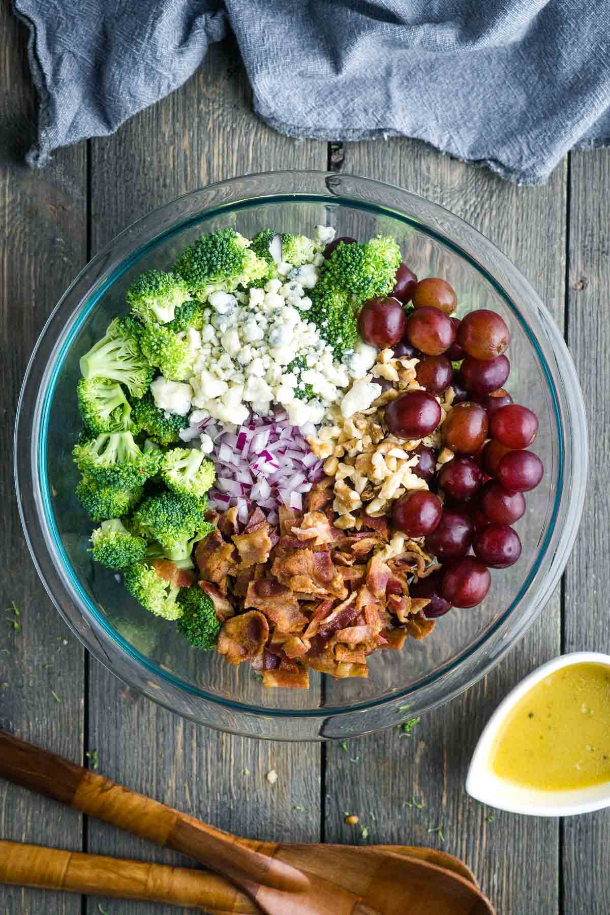 broccoli grape salad in glass mixing bowl