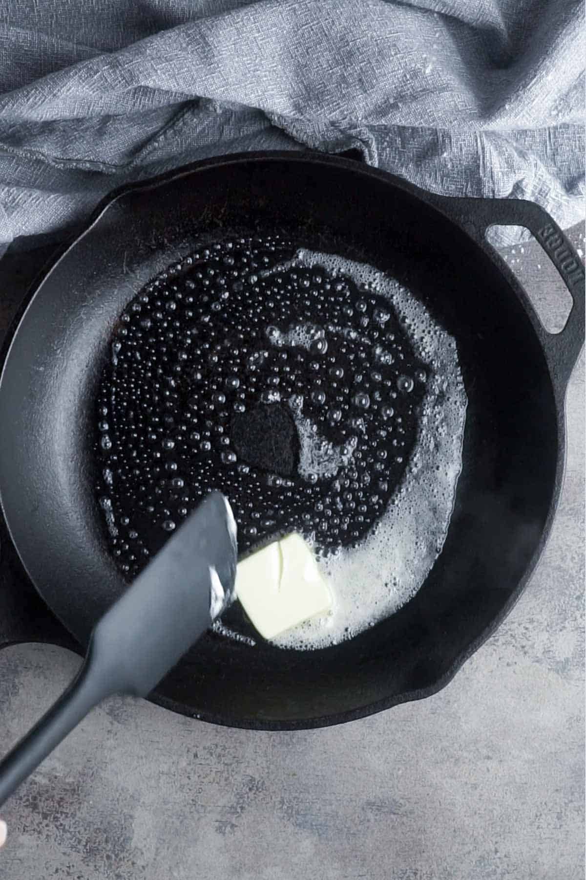 butter melts in hot cast iron skillet