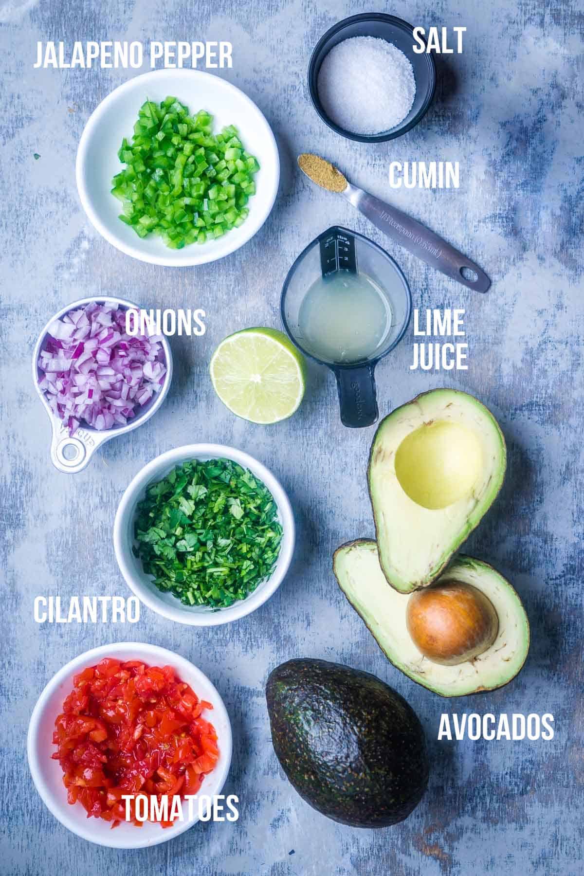 guacamole ingredients in glass bowls labeled with text overlay