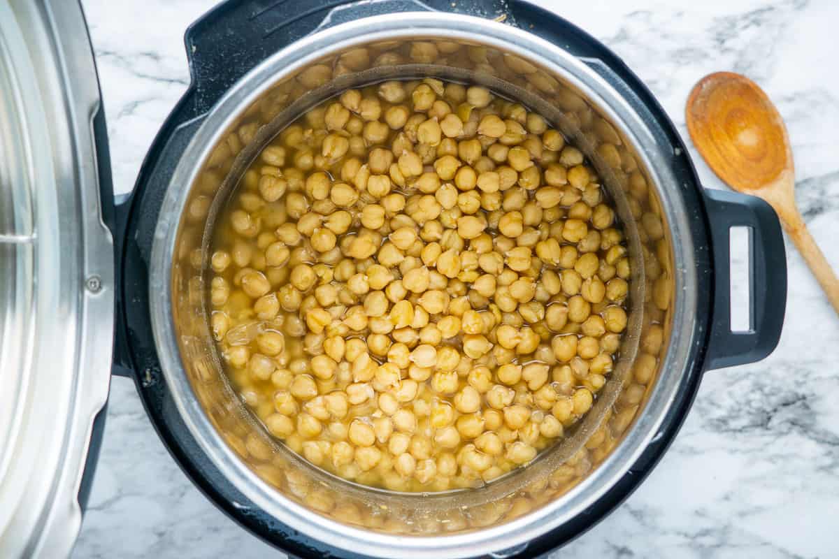 Overhead view of cooked chickpeas in Instant Pot