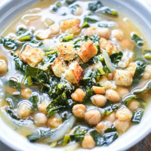 kale chickpea soup in white bowl
