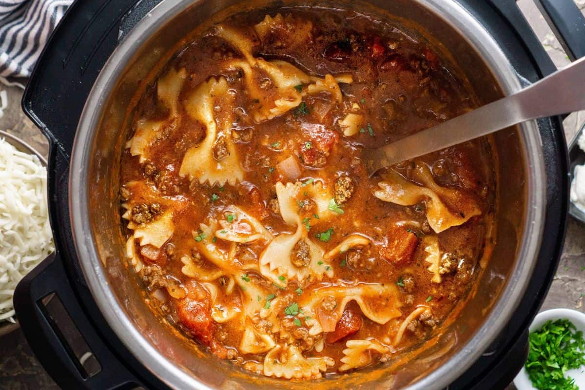 lasagna soup in pot with ladle
