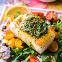 Chilean Seabass on arugula salad with Chimichurri topping