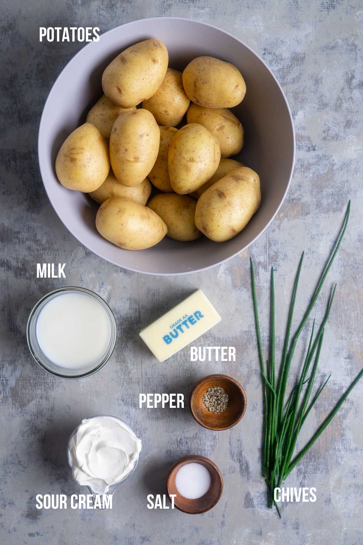 sour cream mashed potatoes ingredients in bowls with text overlay