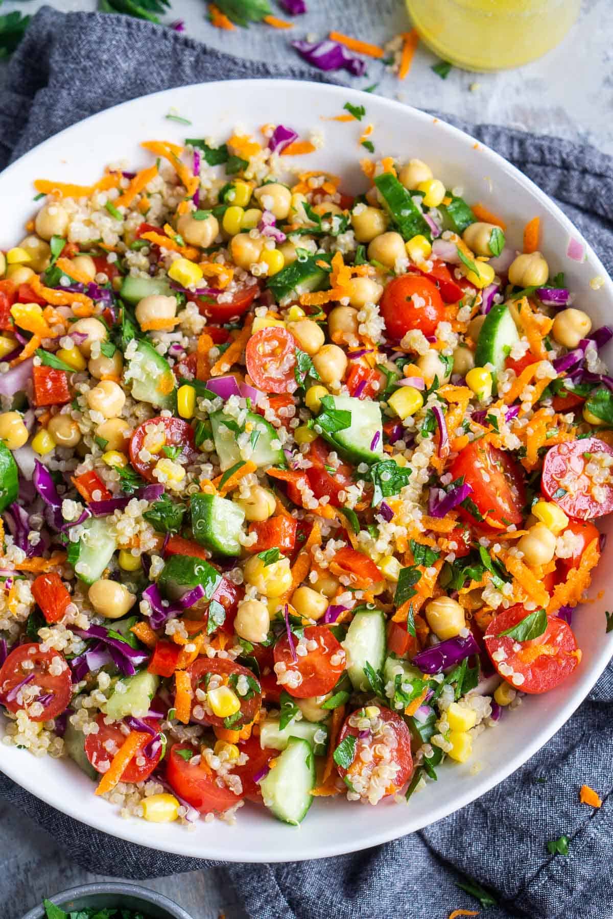 vegetable quinoa salad in white bowl
